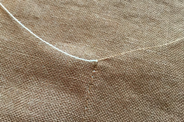 knot threads on pocket 8