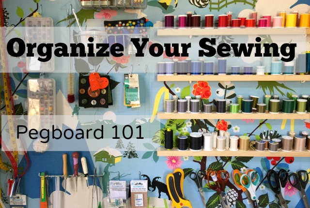 pegboard organization for sewing supplies and a sewing room
