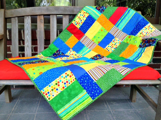 sew a simple colorful quilt for a baby to lay on now and sleep under as they grow. Super simple and a lot of fun to put together plus it makes a great gift