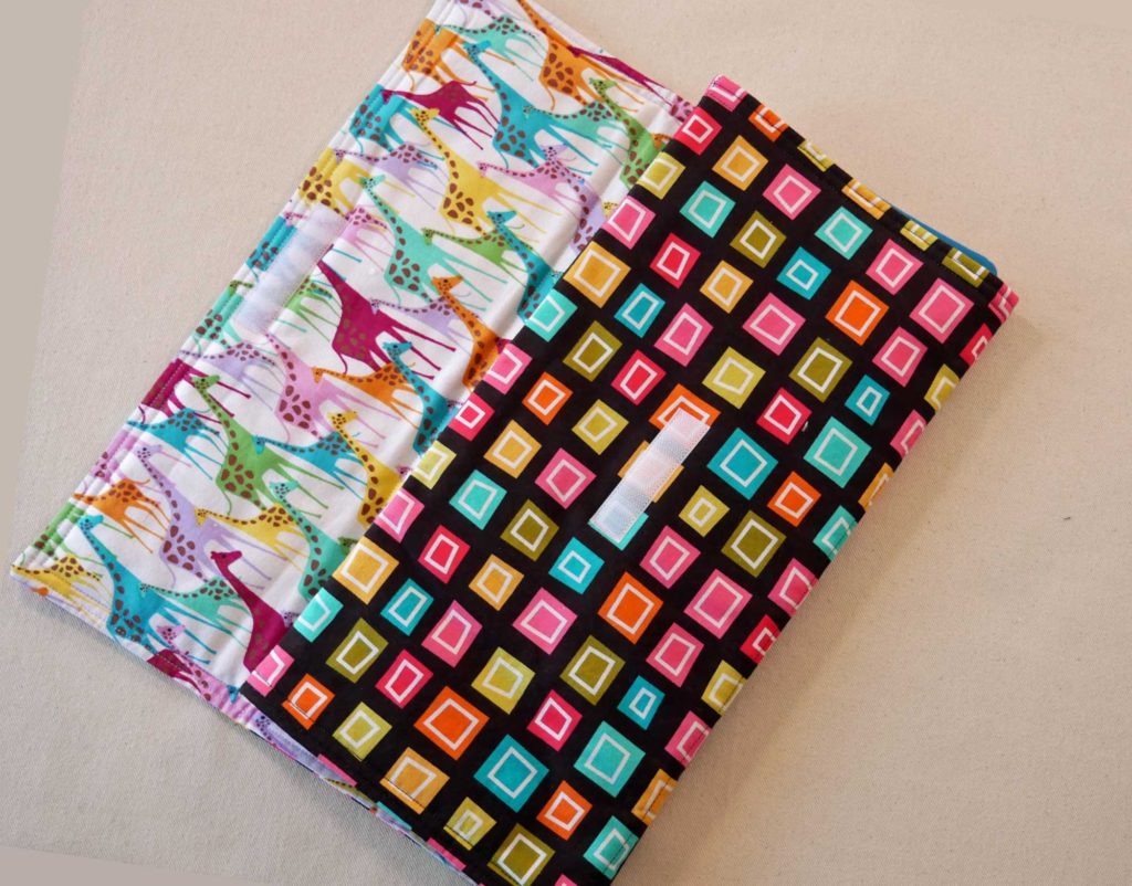 Make an easy to sew, foldable,  baby and tot changing pad with pocket for diapers and wipes