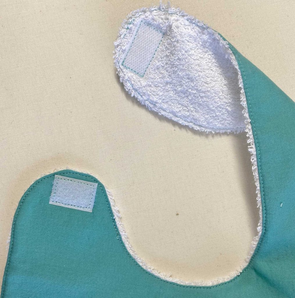 Easy to make baby bibs are a great stash buster project and make a very useful gift for new parents