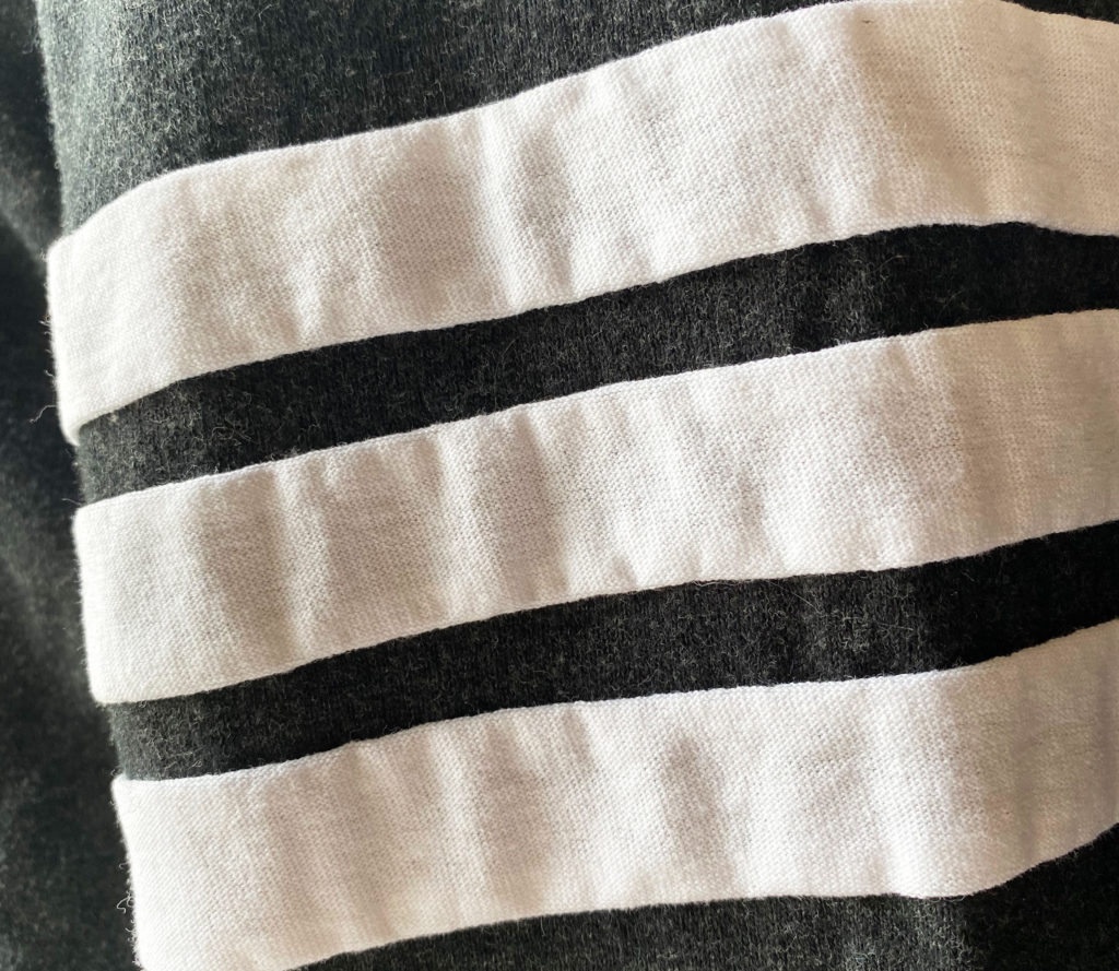 How to sew stripes onto the sleeve of a cardigan