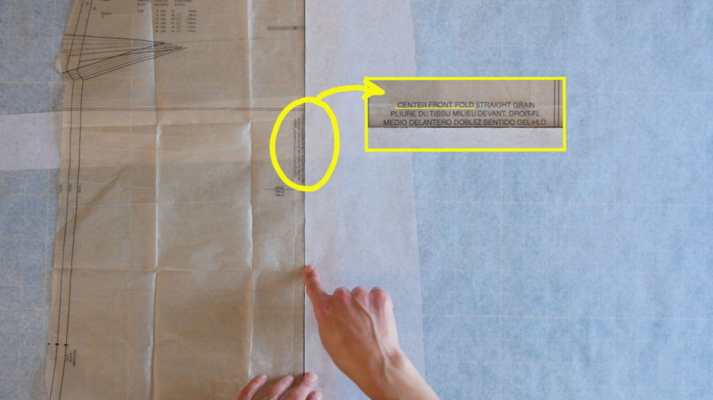 if the pattern is already on tissue paper simply tape more tracing paper to the "place on fold" line