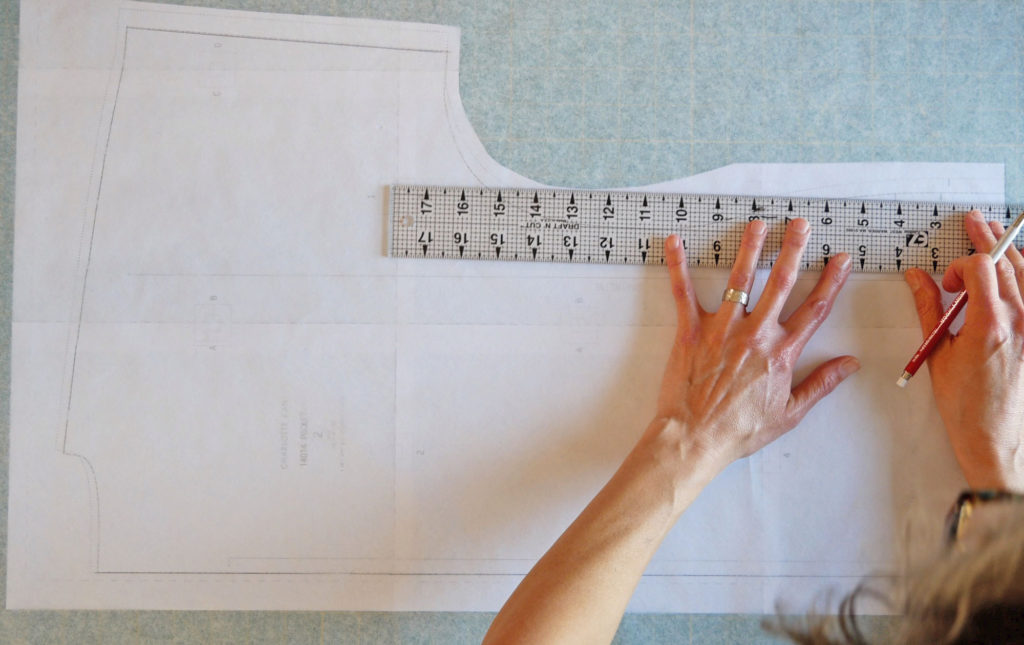 lay tracing paper on the original pattern and trace the entire pattern.