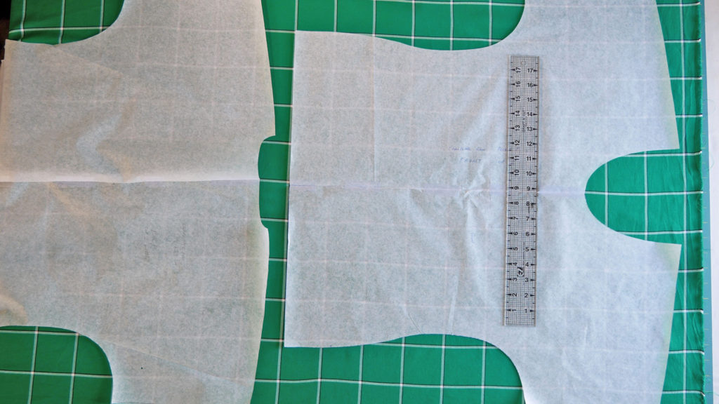 lay out your pattern pieces on fabric