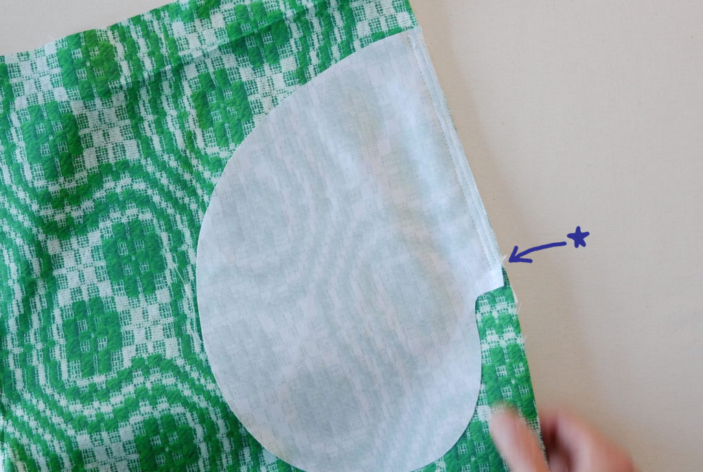 sew the pocket on with a slightly less seam allowance