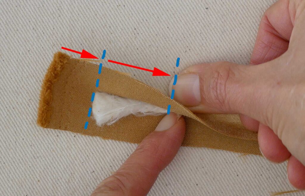place the cord in the strip one inch in from short end. Start sewing one inch down from start of cord