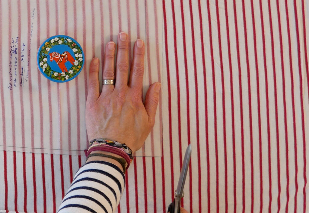 lay your palm flat on the pattern or the fabric when cutting with scissors