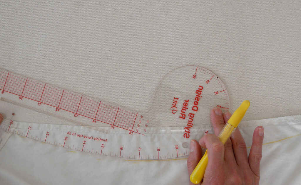 use a curved ruler to connect the marks