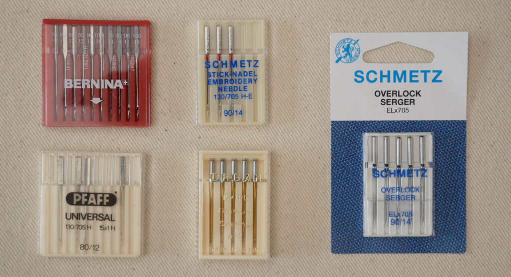 sewing machine needles in the packaging to show what system they are